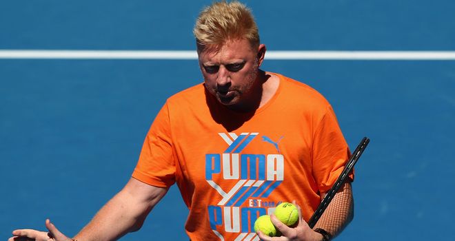 Boris Becker on court in Melbourne helping Novak Djokovic