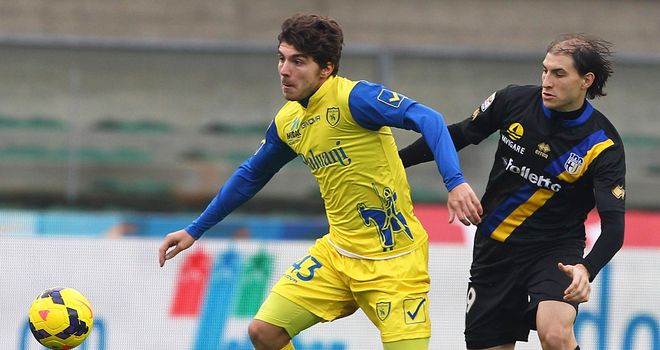 Alberto Paloschi tries to escape Gabriel Paletta