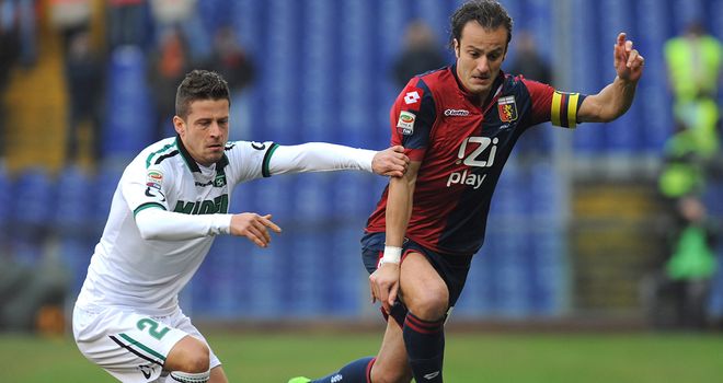 Marcello Gazzola keeps track of Alberto Gilardino