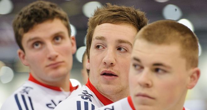 Lewis Oliva, centre, has now won two bronze medals at the event