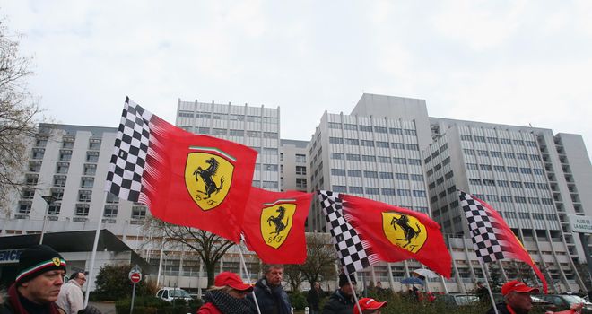 Ferrari fans pay tribute to Schumacher outside the hospital