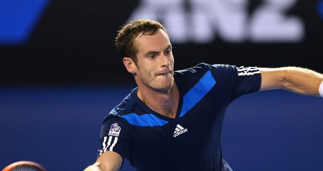 Andy Murray overcame the evening heat to win in straight sets