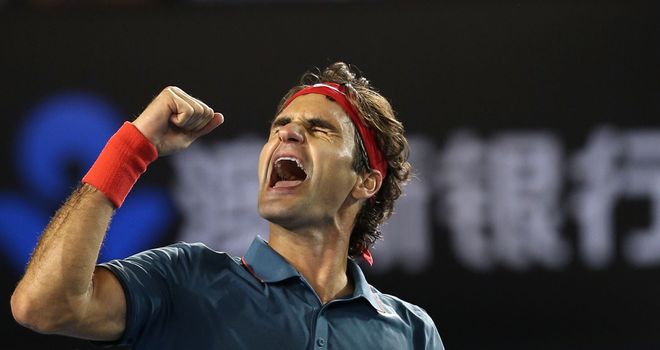 Roger Federer celebrates an emotional victory