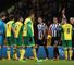 Norwich City's Bradley Johnson (third from left) is shown a red card by referee Chris Foy