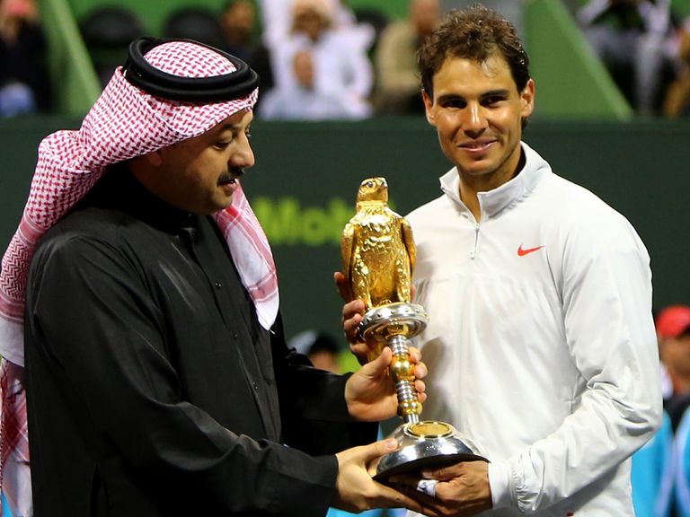 Nadal collects the trophy in Doha