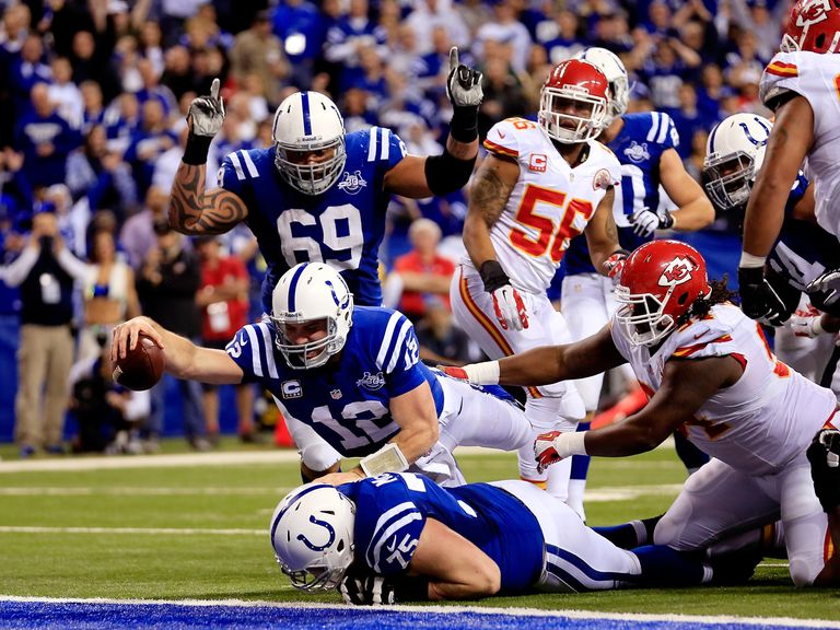 Andrew Luck reaches out to score a touchdown