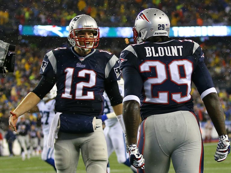 LeGarrette Blount of the New England Patriots celebrates with teammate Tom Brady
