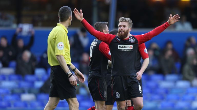 Adam Clayton: Celebrates scoring Huddersfield's second