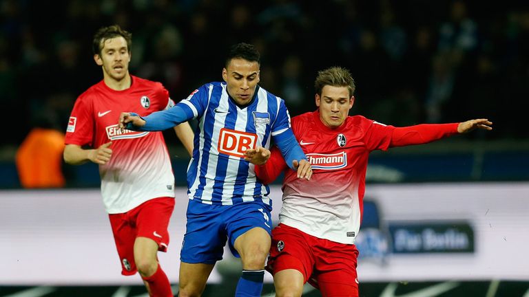 Anis Ben-Hatira and Oliver Sorg compete
