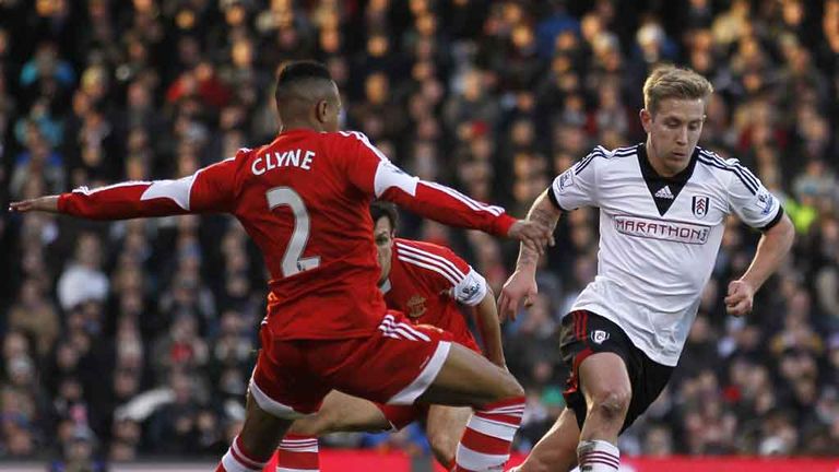 Lewis Holtby vies with Southampton defender Nathaniel Clyne