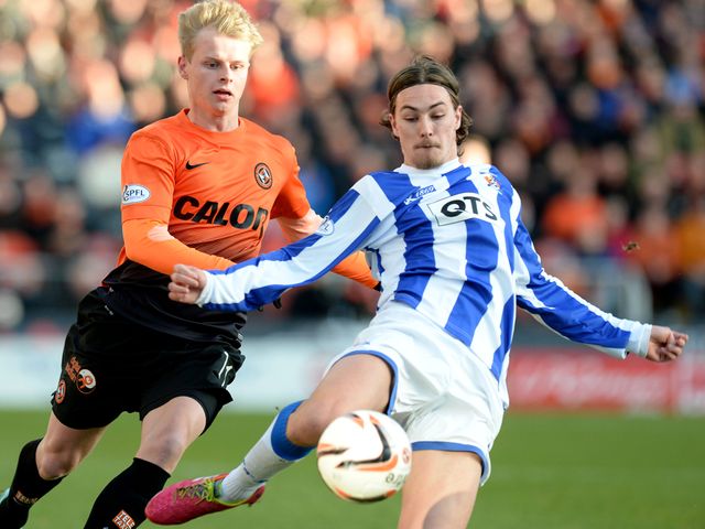 Gary Mackay-Steven battles with Kilmarnock's Jackson Irvine