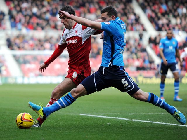 Middlesbrough's Danny Grahmam and Leeds' Jason Pearce