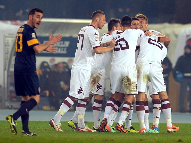 Alessio Cerci is mobbed after netting Torino's second