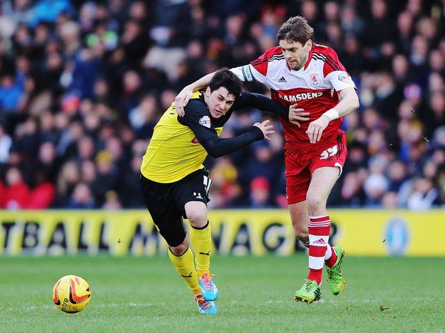 Fernando Forestieri holds off the challenge of Jonathan Woodgate