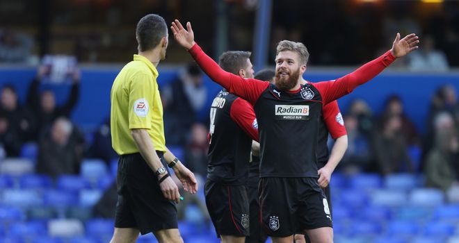 Adam Clayton: Celebrates scoring Huddersfield's second