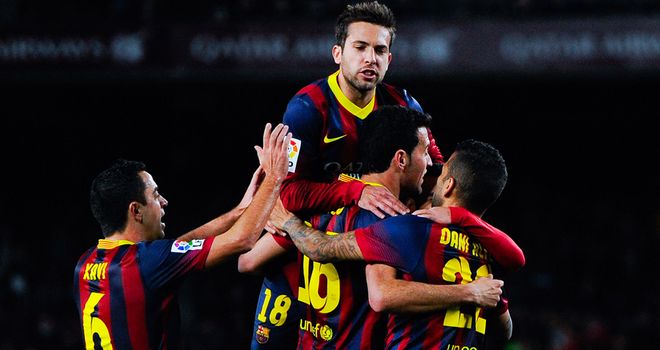 Sergio Busquets: Mobbed after scoring against Sociedad