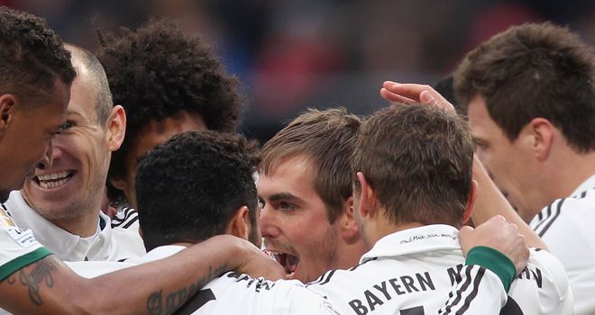 Philipp Lahm celebrates scoring for Bayern Munich