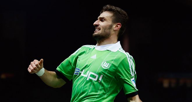 Daniel Caligiuri of Wolfsburg celebrates after scoring