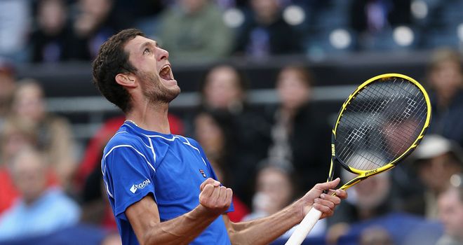 James Ward: British No 2 celebrates his victory over USA's Sam Querrey