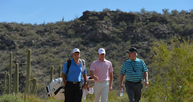 Rory McIlroy (c) during a practice round in Arizona with caddie JP Fitzgerald (l) and putting coach Dave Stockton (r)