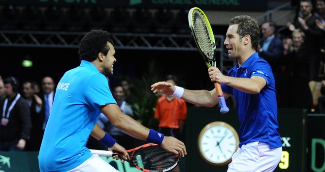Jo-Wilfried Tsonga and Richard Gasquet celebrate beating Australia