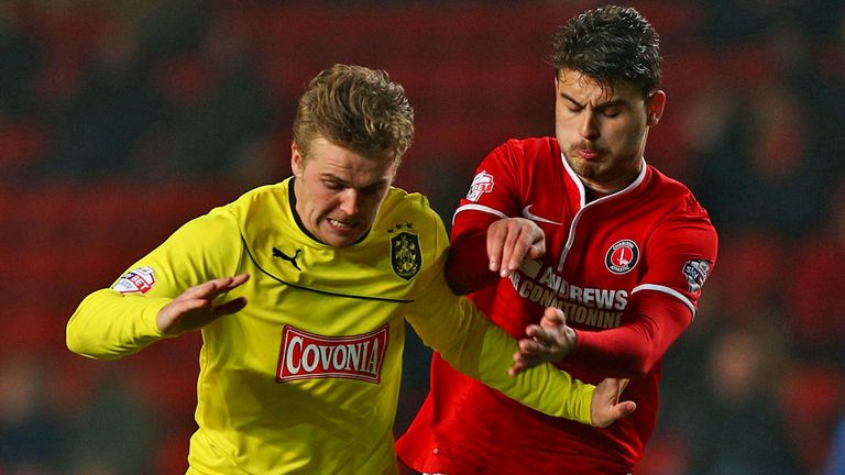 Charlton's Astrit Ajdarevic and Danny Ward of Huddersfield in action