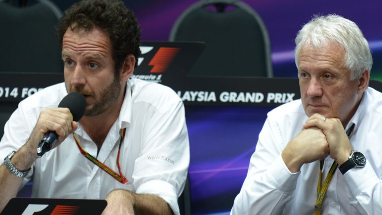 Charlie Whiting (R) believes standing restarts won't create additional risks