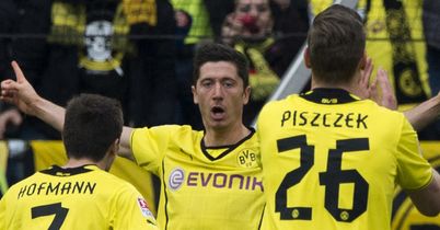 Dortmund celebrate on their way to victory at Hannover