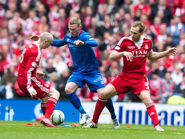 Billy McKay tries to find space