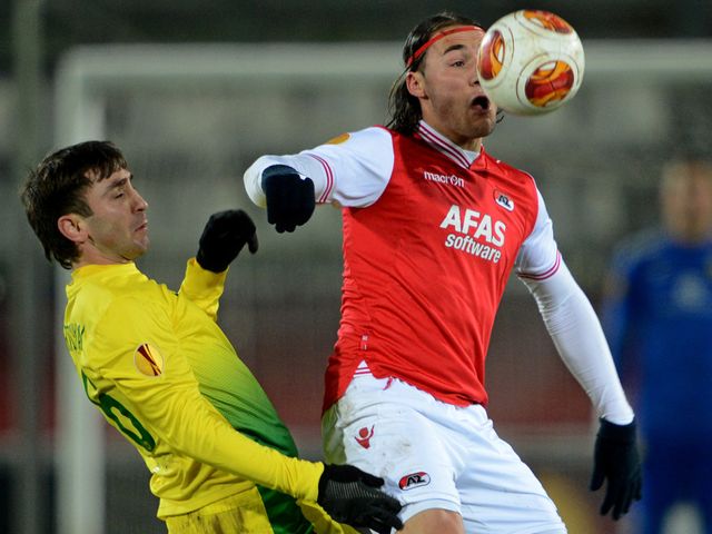 Nemanja Gudelj gets to the ball first