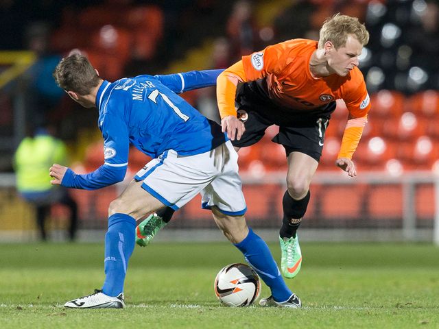 Gary Mackay-Steven is fouled by Chris Millar