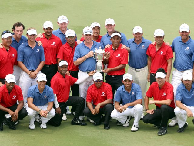 Players from both teams pose with the trophy after a dramatic 10-10 draw