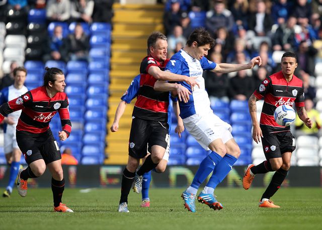 Nikola Zigic shields the ball from Clint Hill