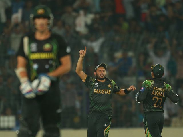 Shahid Afridi celebrates after running out Mitchell Starc