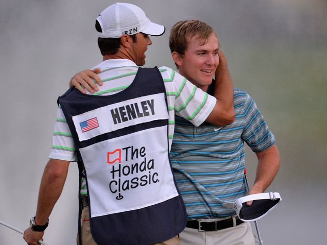 Russell Henley celebrates winning the Honda Classic