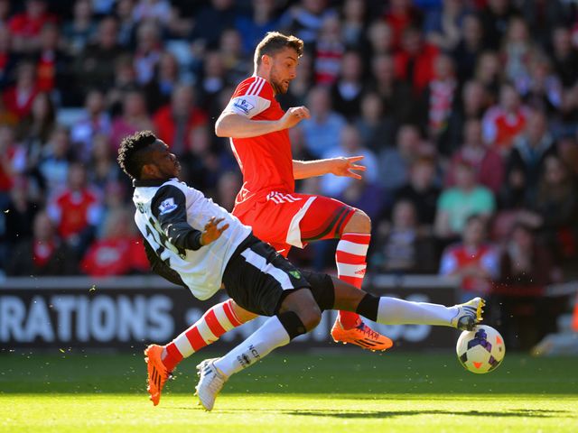 Morgan Schneiderlin is tackled by Daniel Sanchez Ayala