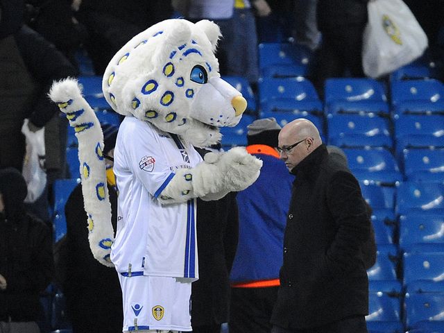Brian McDermott leaves the field after defeat