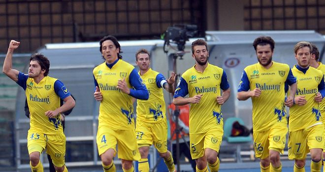 Alberto Paloschi (left) of Chievo celebrates after scoring
