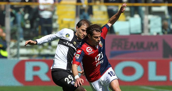 Emanuele Calaio is challenged by Gabriel Paletta