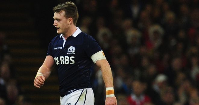 Stuart Hogg leaves the pitch in Cardiff
