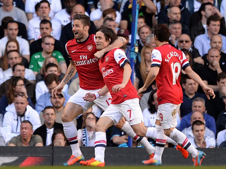 Rosicky celebrates after scoring the only goal at White Hart Lane