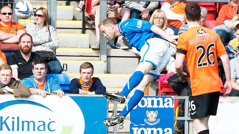 St Johnstone defender Steven Anderson opens the scoring against Dundee United