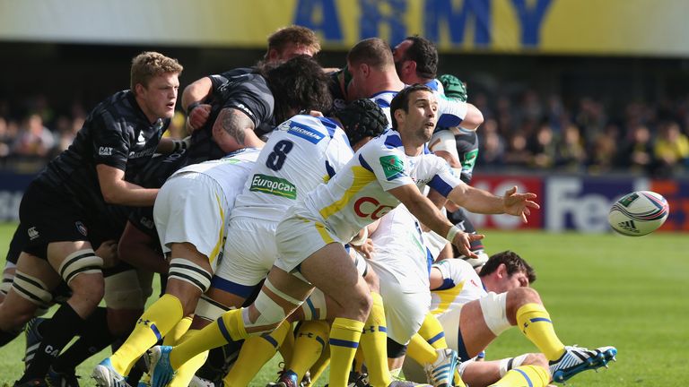 Clermont's Morgan Parra spins out a pass