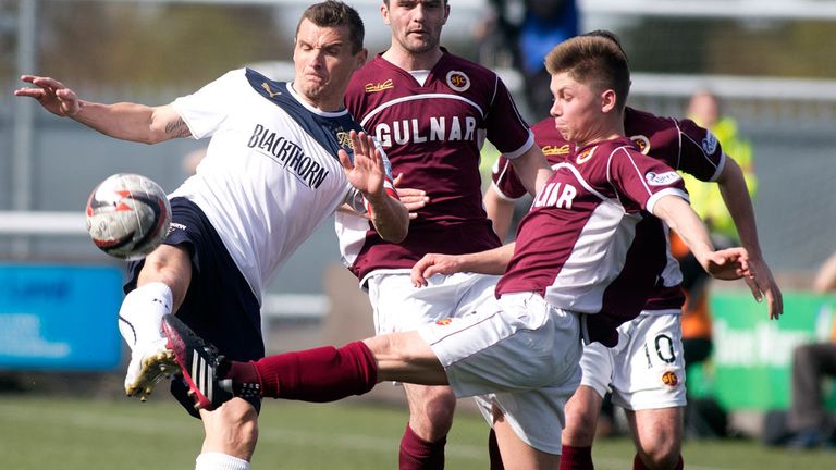 Rangers captain Lee McCulloch and Stenhousemuir's Brian Hodge battle for the ball