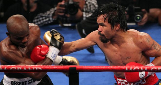 Pacquiao lands on Bradley in their first meeting