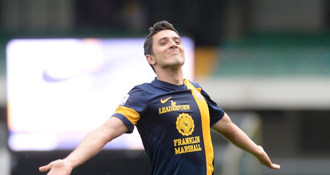 Marquinho celebrates after scoring for Verona on Sunday