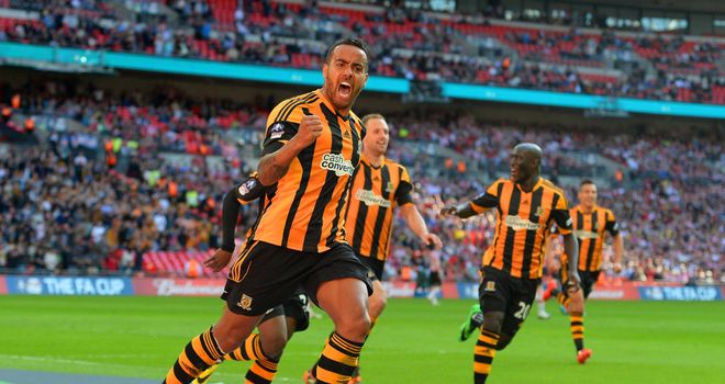 Tom Huddlestone: Celebrates scoring Hull's third goal