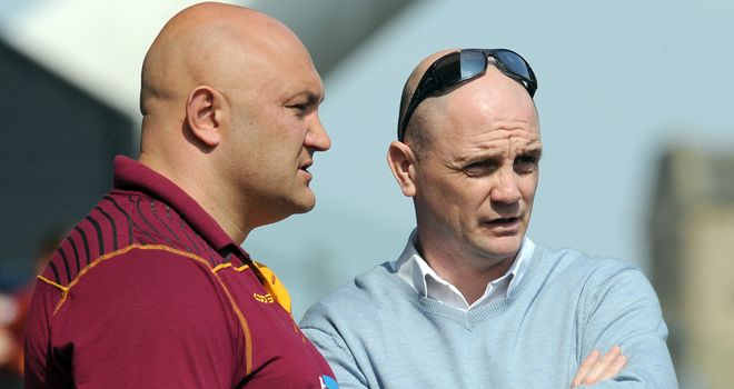 Paul Anderson (L) and Richard Agar look on before Huddersfield's victory