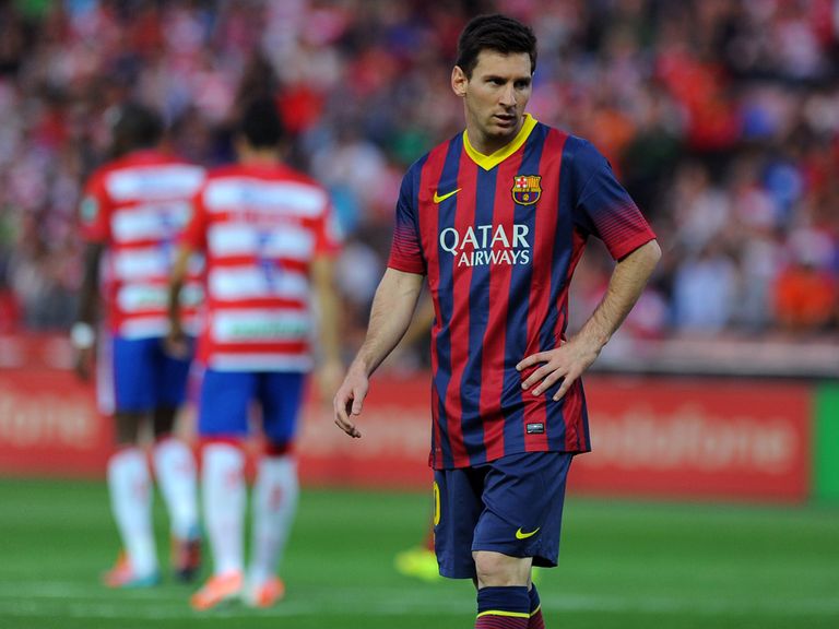 Barcelona's Lionel Messi shows his disappointment