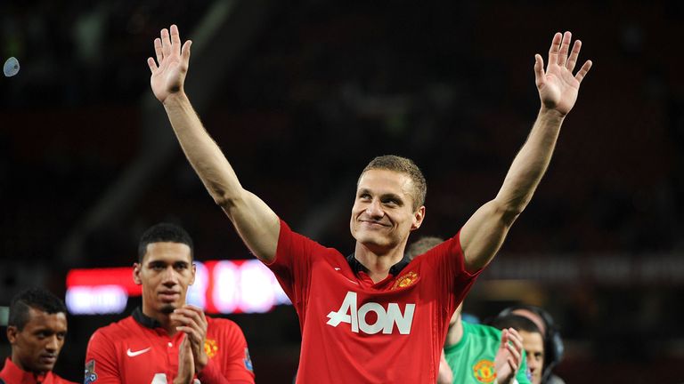 Vidic waves to Manchester United supporters after his last game at Old Trafford